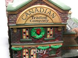 Dept 56 Christmas Dickens Village Canadian Trading Co w Village Peddlers Light